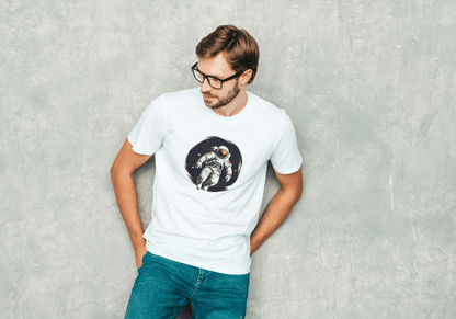 Astronaut Floating in Space: Cosmic Explorer Graphic Tee - Essentia Attire