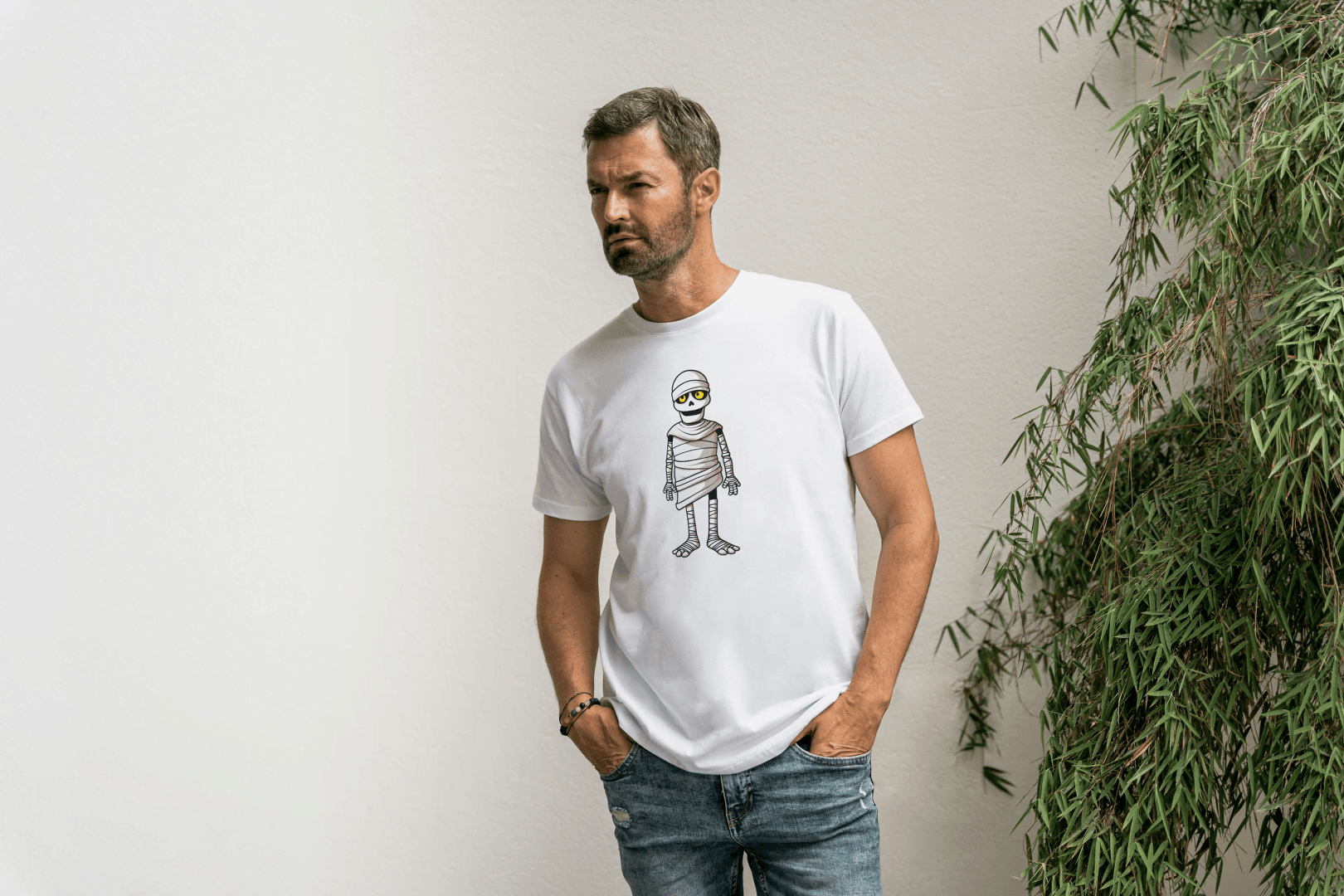 Cute Cartoon Mummy: Glowing Eye Mummy Tee - Essentia Attire