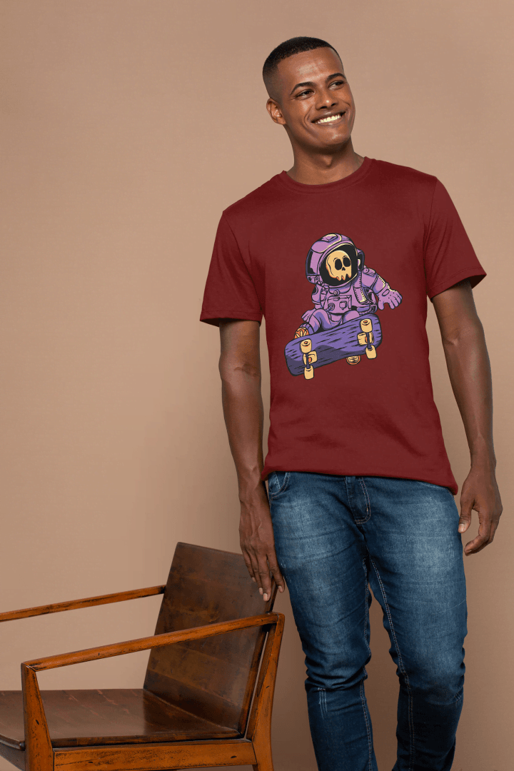 Astronaut Skull Skateboard: Space Skater Graphic Tee - Essentia Attire